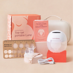 Tire-lait Luna de MammaBump avec sa boîte, ses inserts de téterelle et ses accessoires
