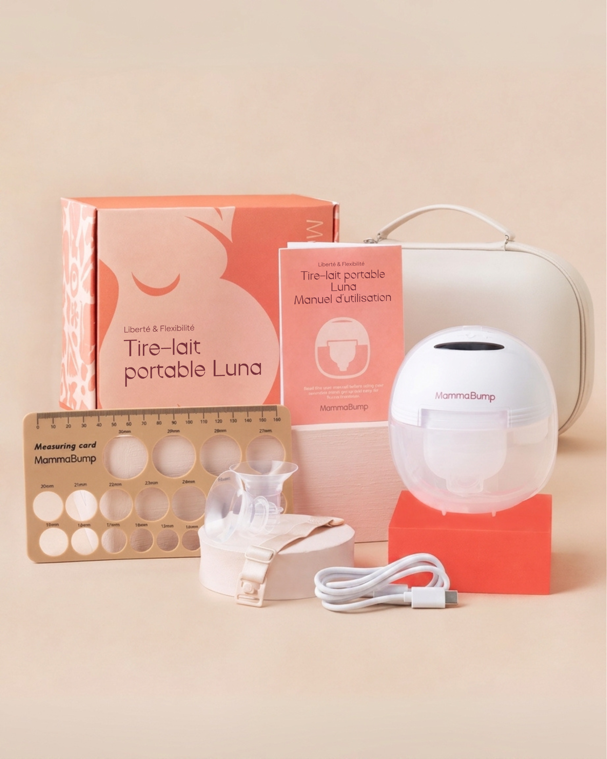 Tire-lait Luna de MammaBump avec sa boîte, ses inserts de téterelle et ses accessoires